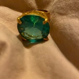 Blue green tone ring with gold tone